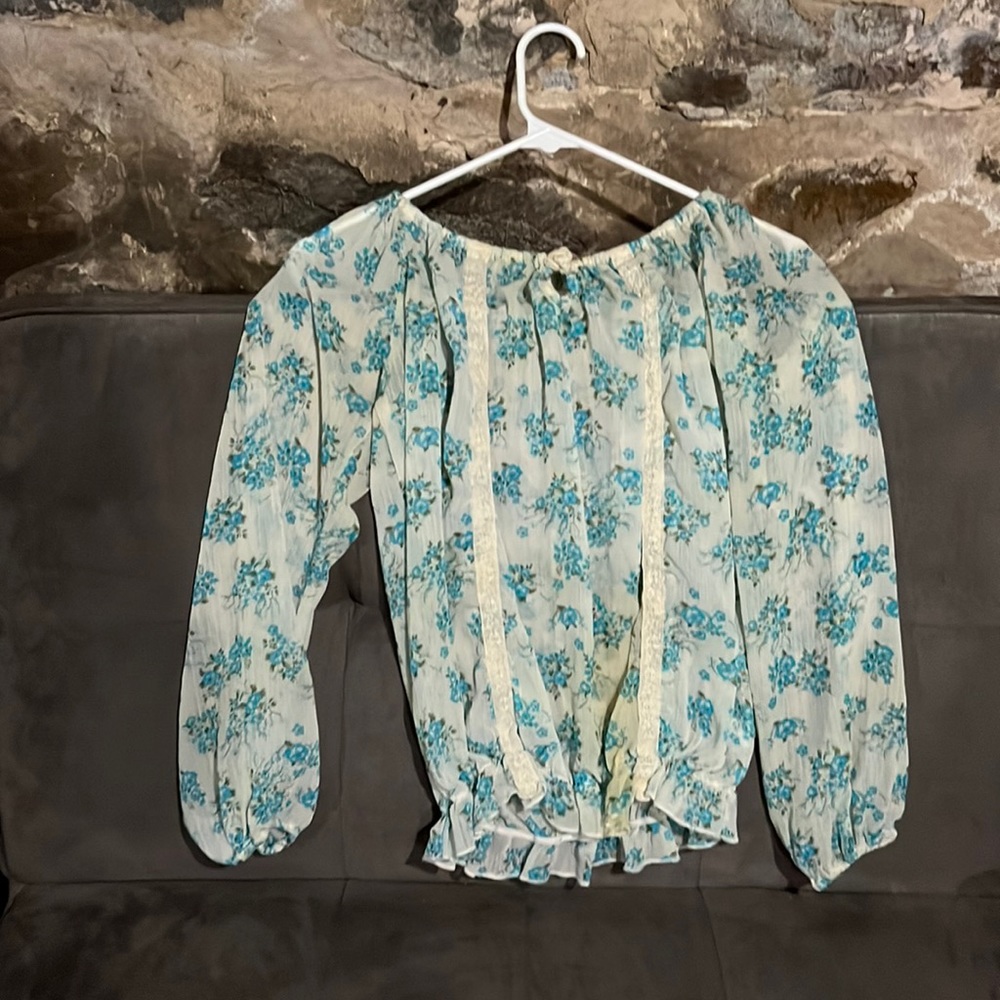 Blue and white flowered blouse